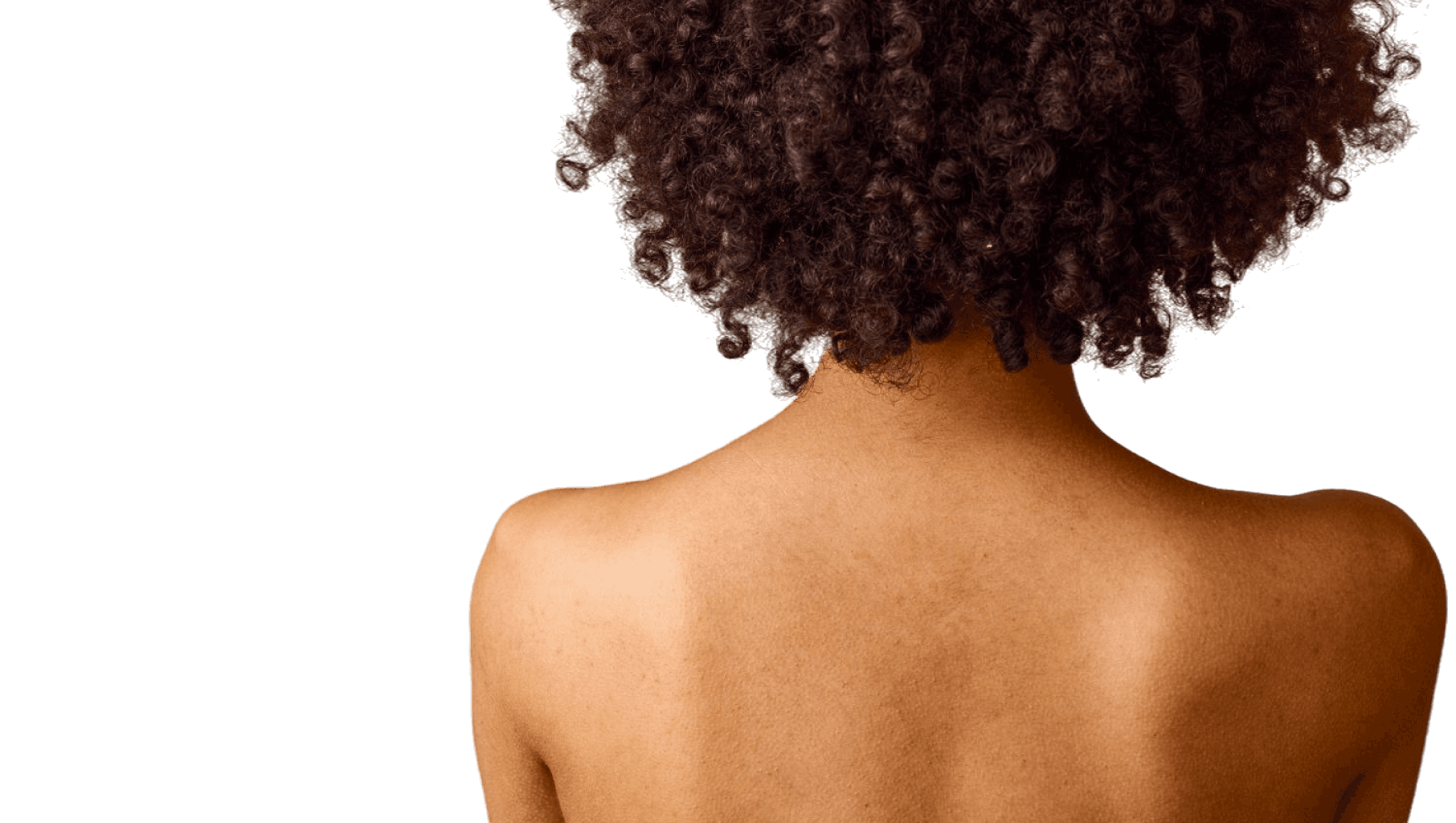 Woman's back and curly hair, close-up, representing health and future